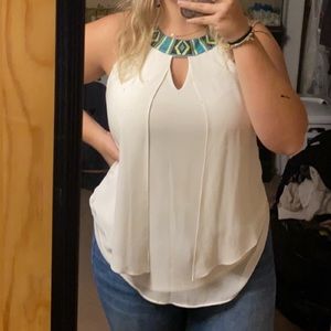 White tank top with a colorful neckline